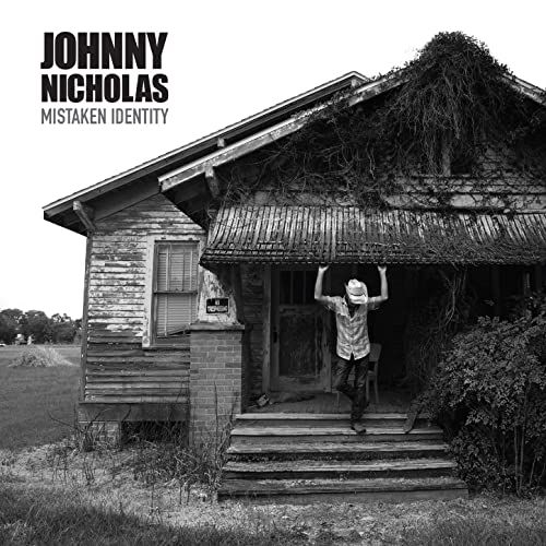 Mistaken Identity / Johnny Nicholas | Nicholas , Johnny . Chant. Guitare. Piano. Harmonica. Composition. Paroles